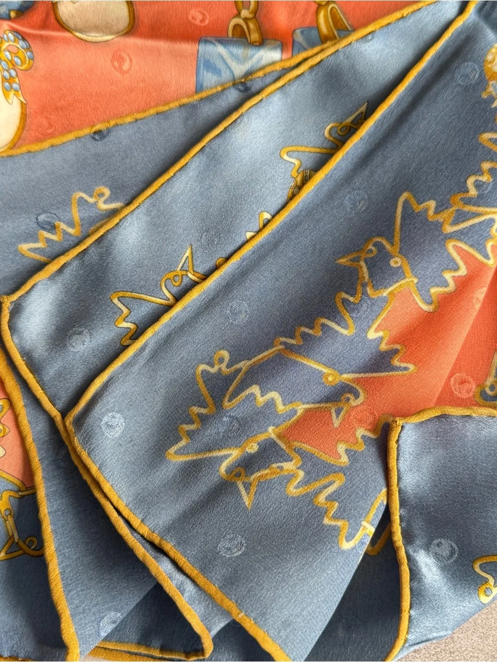 Nina Ricci Coral Scarf with Blue and Gold Jewelry Motifs
